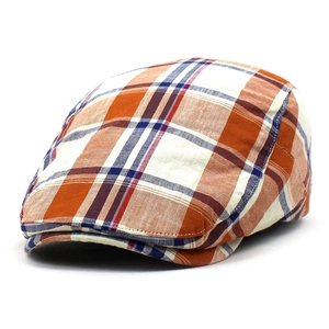 Klassische Schiebermütze mit orange-blauem Karomuster im britischen Vintage-Stil
