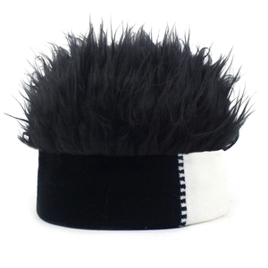 Close-up of black and white knit base with dense faux fur wig hair texture on top