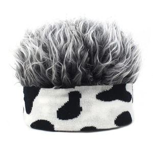 Detail of cow print knit headband with fluffy grey synthetic hair for costumes