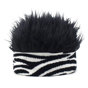 Detail of the black synthetic wig hair and zebra print knit headband for party fun