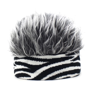 Detail of creative knit headband with zebra pattern and long faux fur grey hair decoration