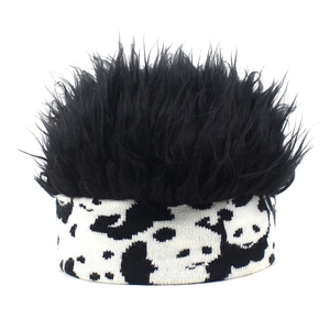 Detail of funny punk style wig headband with black hair and panda pattern band