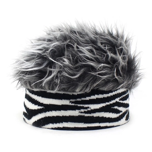 Winter striped knit beanie with funny fluffy faux fur top for women and kids
