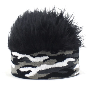 Detail of black faux hair wig hat with a gray and white camouflage pattern headband
