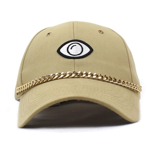 Front view of khaki baseball cap with eye embroidery and decorative gold metal chain