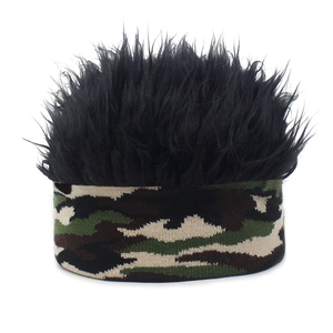 Detail view of the camouflage headband base with thick black synthetic hair fibers