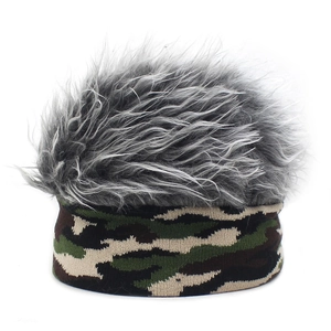 Detail of knit beanie with camouflage pattern and grey faux fur top wig effect