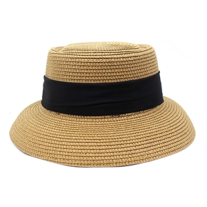 Classic summer straw sun hat with wide brim and elegant black ribbon trim