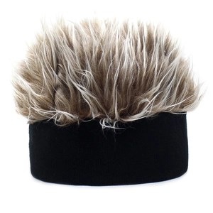 Detail of creative knit beanie with a fluffy spikes wig top made of synthetic fiber
