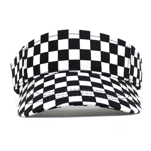 Summer black and white checkerboard sun visor hat with wide brim and canvas texture