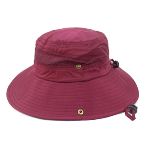 Detail of burgundy outdoor sun hat showing breathable mesh vents and adjustable drawcord