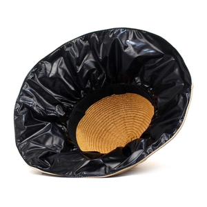 Foldable straw sun hat with black UV lining and wide brim for maximum sun protection