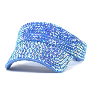 Detailed close-up of sky blue sun visor cap with sparkling colorful rhinestones