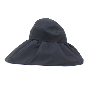 Detail of black wide brim sun hat with ruffled edge and UV protective fabric