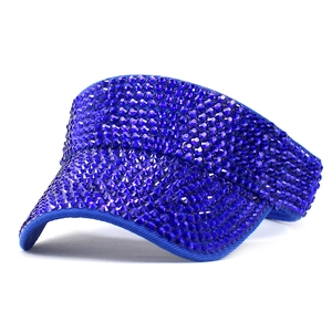 Detailed view of royal blue sun visor hat fully embellished with sparkling rhinestones
