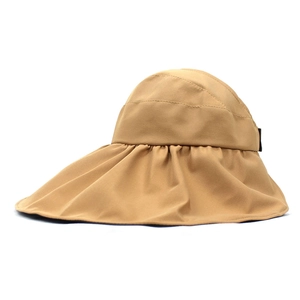 Close-up of khaki wide-brim sun hat showing lightweight fabric and wavy fold details
