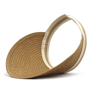 Close-up of the natural woven straw texture and breathable wide brim of this sun visor hat