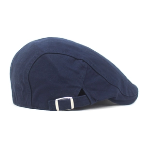 Classic navy cotton flat cap with adjustable metal side buckle and twill texture
