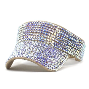 Close-up of sparkling AB rainbow rhinestones on a stylish open-top summer sun visor hat