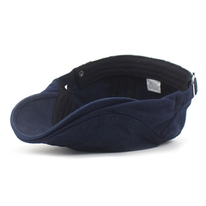 Detail view of the cotton newsboy cap interior featuring sweatband and adjustable metal buckle