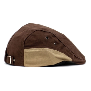 Detail of vintage cotton flat cap with metal side eyelets and adjustable rear buckle
