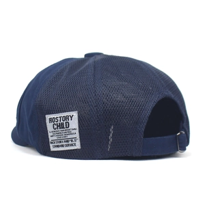 Navy blue breathable mesh newsboy cap with adjustable metal buckle and vintage label