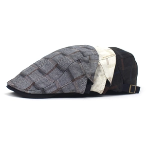 Three vintage plaid newsboy caps in grey, beige, and coffee with adjustable metal buckles