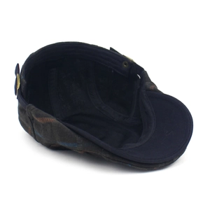 Vintage plaid newsboy cap in dark cotton with subtle brown and blue checkered patterns