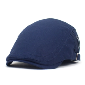 Classic dark blue cotton flat cap with side metal buckle on a clean white background