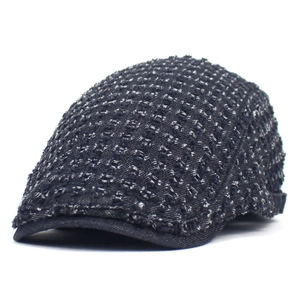 Retro flat cap in dark blue tweed fabric with shimmering silver silk and front brim