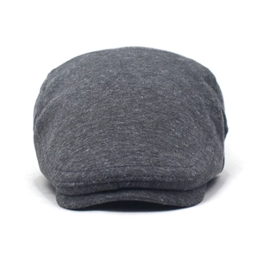 Detailed view of dark grey flat cap with knit texture and reinforced brim stitching