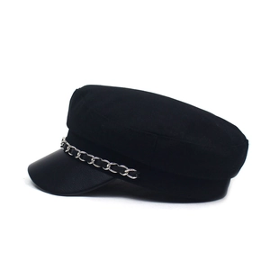 Fashionable black wool newsboy hat with PU leather brim and silver metal chain detail