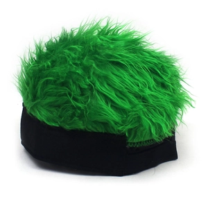 Detail of creative green wig beanie with fluffy plush fur and black fabric headband