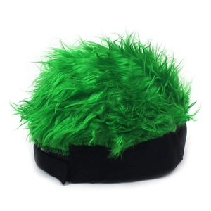 Macro shot of vibrant green faux hair texture and black brim on fun party wig cap
