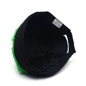 Detail view of cotton docker hat interior with 100% cotton tag and adjustable strap