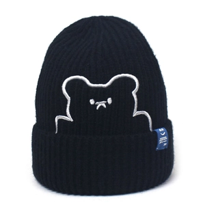 Black ribbed knit beanie with cute bear embroidery and blue logo label for winter warmth
