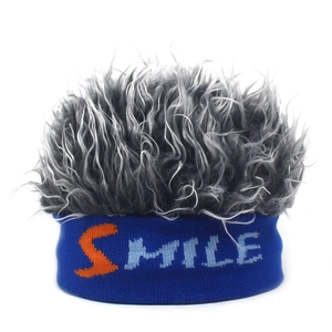 Detail of blue knitted headband with SMILE lettering and grey synthetic wig hair extension