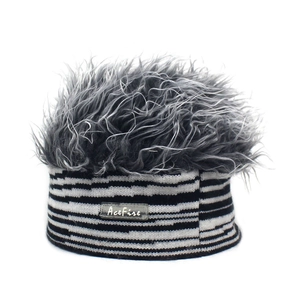 Detail of Acefire zebra knit beanie with fluffy grey faux hair and logo branding