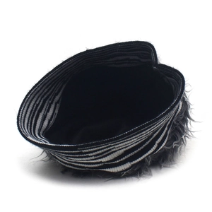 Detailed view of grey fuzzy knit hat with zebra pattern elastic headband for cosplay