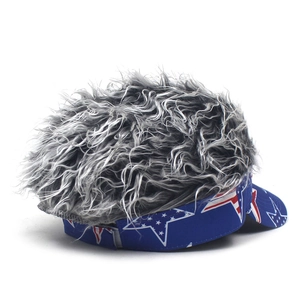 Detailed view of blue star patterned visor hat with messy silver-grey synthetic hair