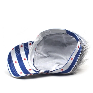 Detail of blue and white striped baseball cap with red star print and gray wig attachment
