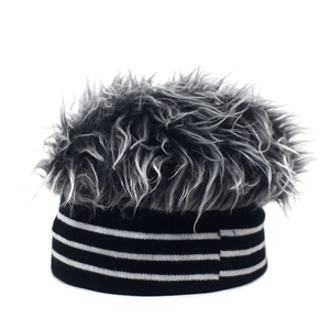 Detailed view of striped knit wig beanie with textured faux fur top and elastic band