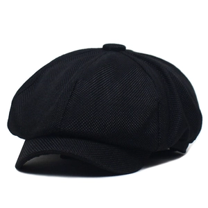 Classic black breathable faux linen newsboy cap with eight-panel structure and mesh texture