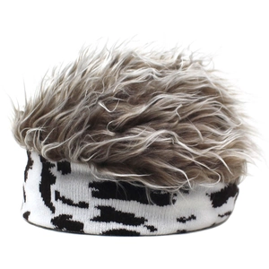 Detail of knit visor hat with cow print pattern and shaggy greyish brown synthetic wig hair