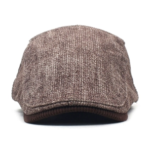 Classic Men's brown corduroy flat cap for winter warmth featuring a vintage textured finish