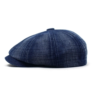 Men's navy blue denim newsboy cap with checkered texture and warm fleece lining