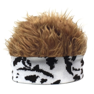 Close-up of fluffy dark brown wig top and black and white patterned knit headband detail