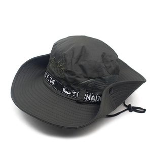 Detail of outdoor sun hat featuring breathable mesh crown and adjustable windproof strap