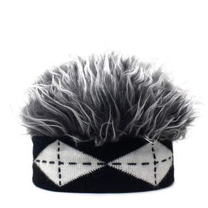 Detail of black knit beanie with argyle pattern and grey faux wig hair attachment
