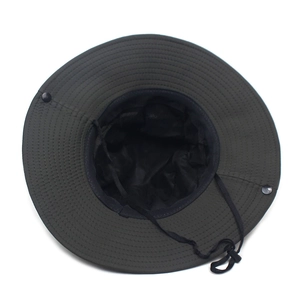 Detail of dark army green sun hat with wide brim, metal snaps and adjustable wind cord